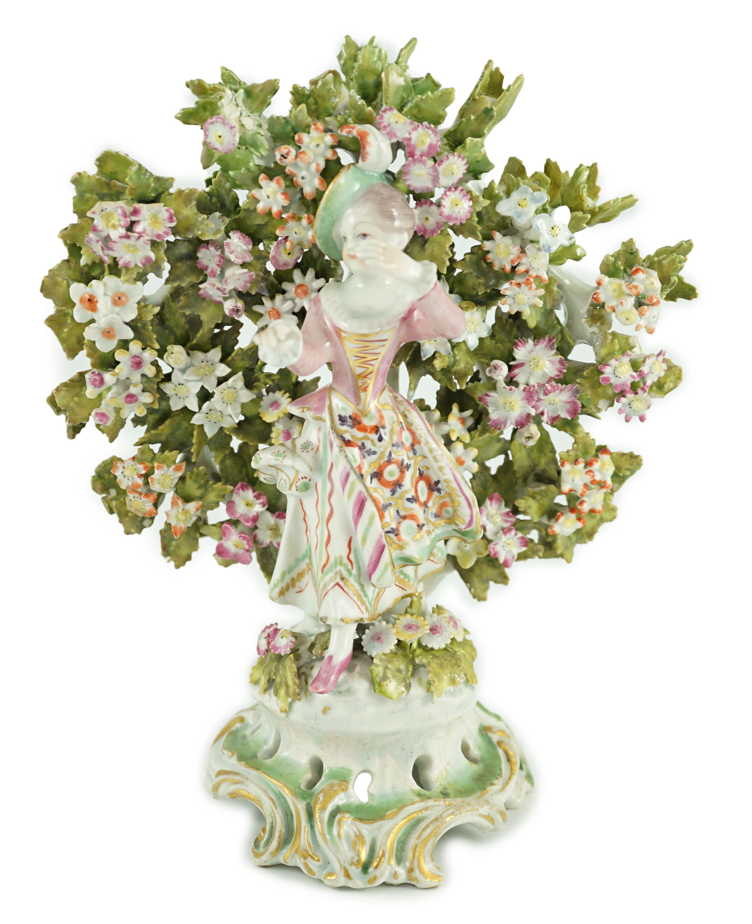 A Bow porcelain bocage figure of a lady, c.1765, 23.2cm high, some restoration